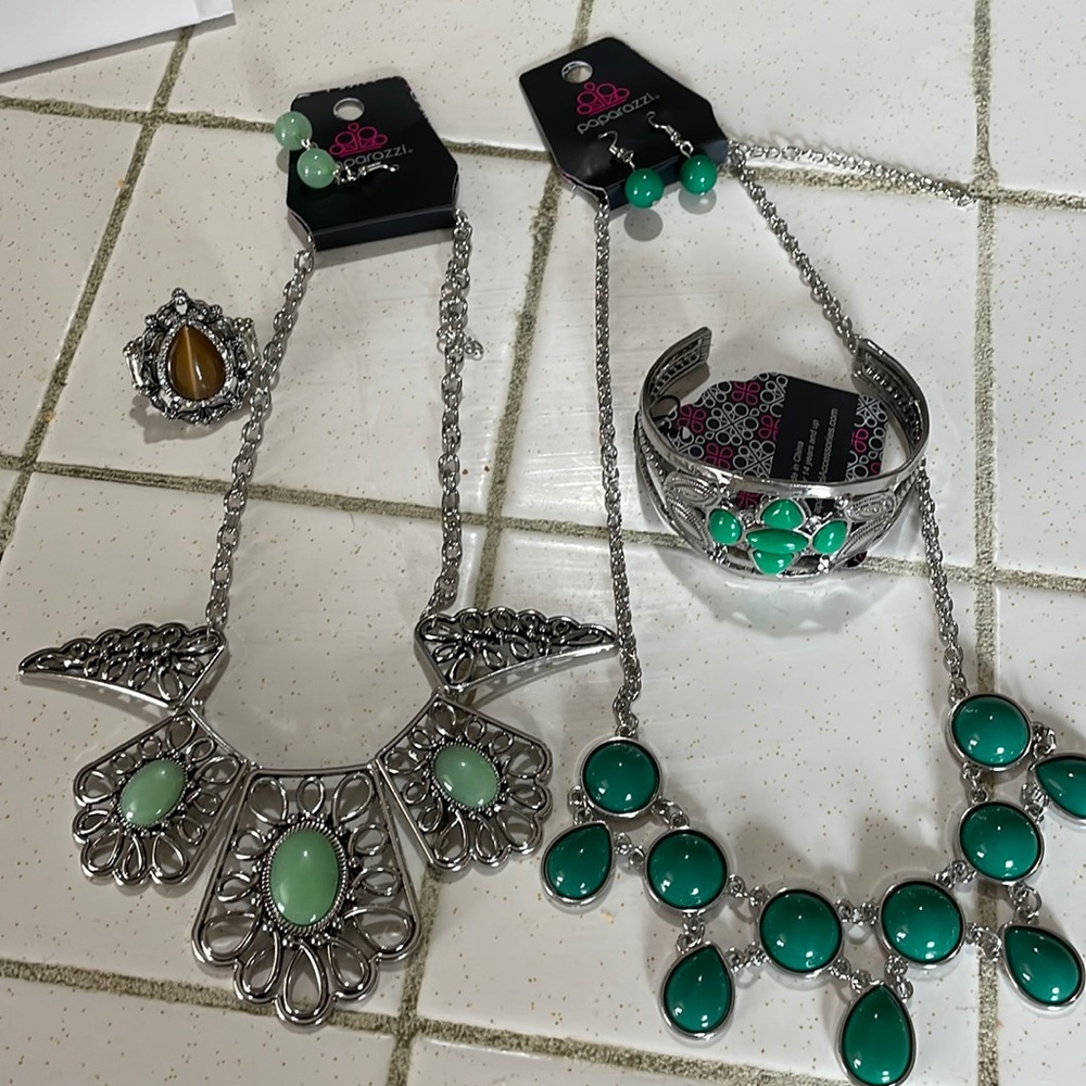 Paparazzi jewelry two necklaces, a bracelet, and ring